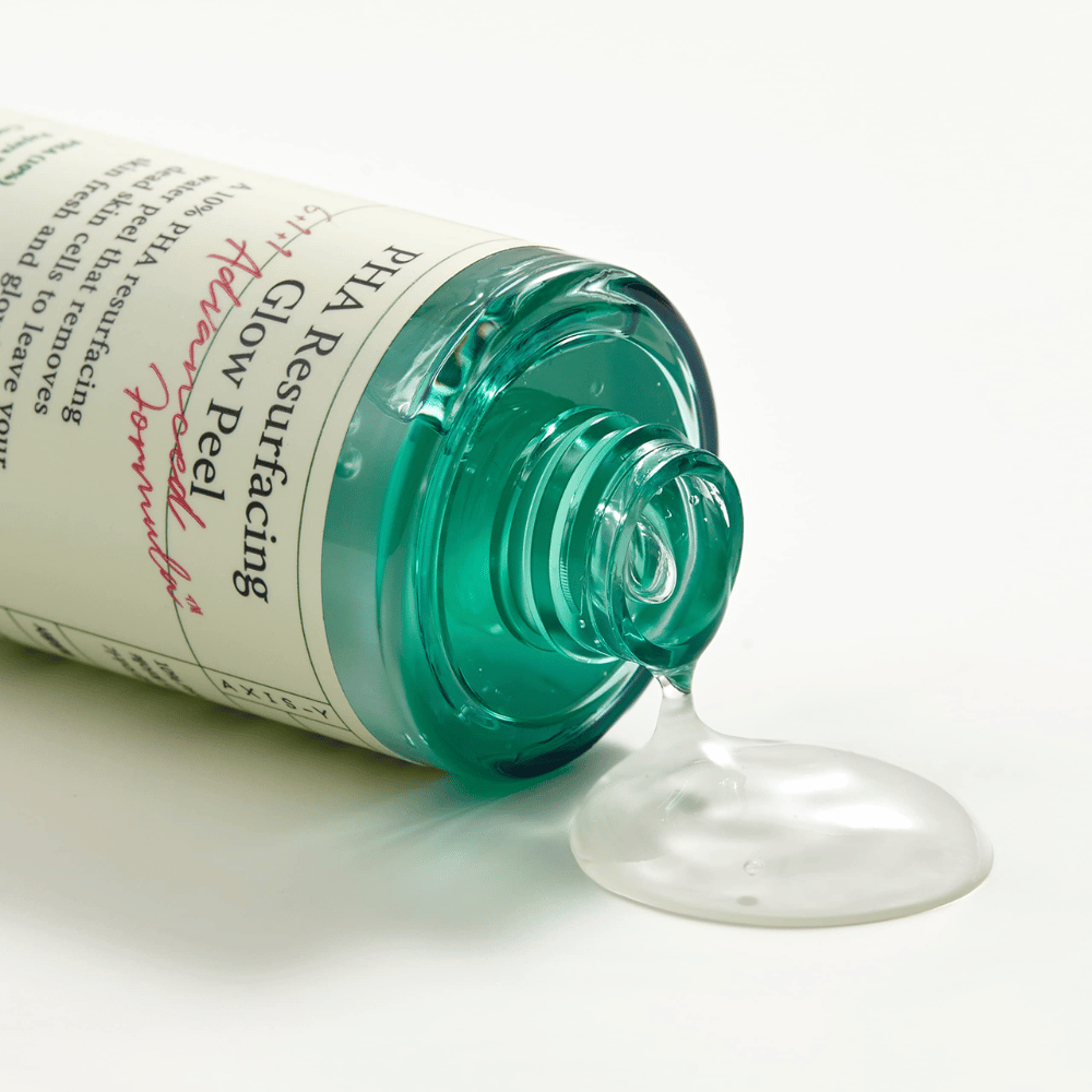 Ένα μπουκάλι AXIS - Y PHA Resurfacing Glow Peel 50ml σε μια λεία επιφάνεια.