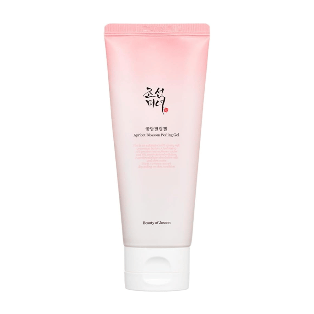 Ένας ροζ σωλήνας με Apricot Blossom Peeling Gel από Beauty of Joseon σε λευκό φόντο.