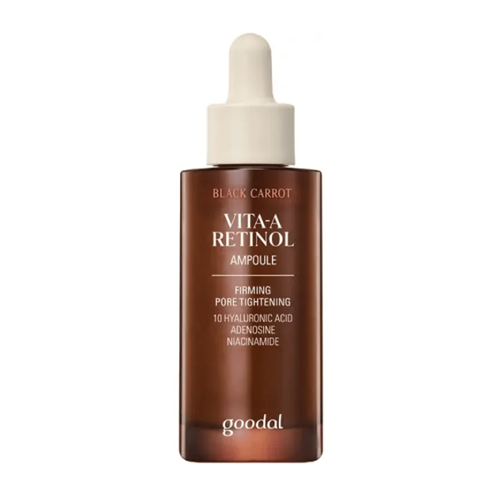Το μπουκάλι με Goodal Black Carrot Vita-A Retinol Firming Ampoule εμφανίζεται. Έχει μπεζ πιπέτα και σκούρο καφέ μπουκάλι. Η ετικέτα περιγράφει το προϊόν ως "Vita-A Retinol Ampoule" και αναφέρει ιδιότητες όπως "Σύσφιξη Πόρων", καθώς και συστατικά όπως 10% υαλουρονικό οξύ, αδενοσίνη και νιασιναμίδη.