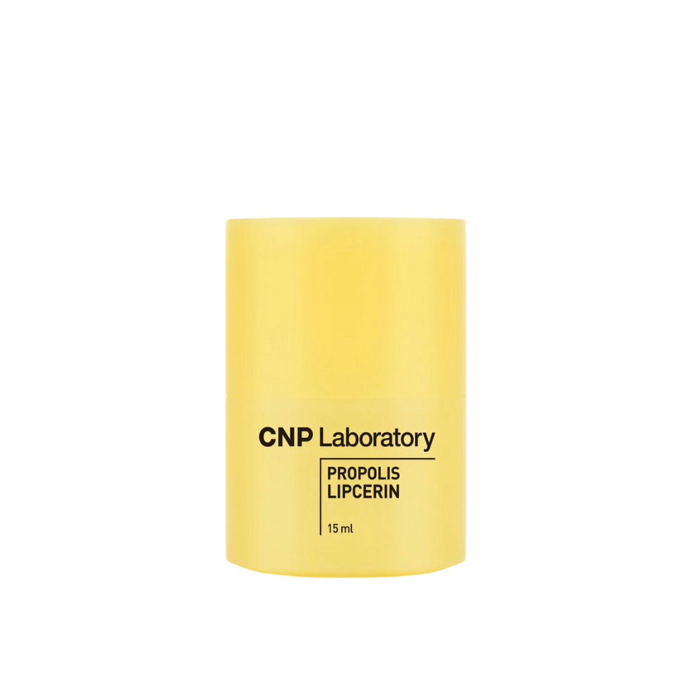 Ένας κίτρινος σωλήνας από CNP Laboratory Propolis Lipcerin με απλό, καθαρό σχεδιασμό. Το προϊόν περιέχει 15 ml και έχει σχεδιαστεί για να προσφέρει εντατική ενυδάτωση και φροντίδα για τα χείλη.