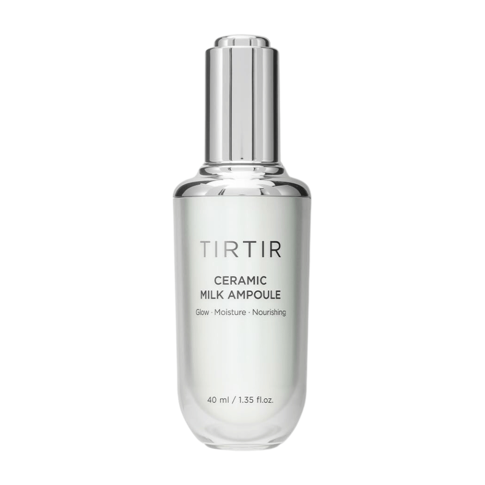  Ένα διάφανο μπουκάλι TIRTIR Ceramic Milk Ampoule, με την ένδειξη "Glow - Moisture - Nourishing", σε λευκό φόντο.