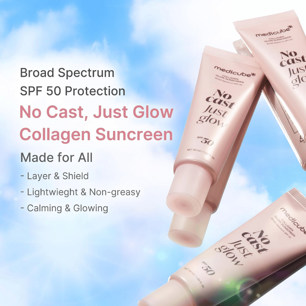 Medicube Αντηλιακό Collagen Glow SPF 50, ελαφρύ αντηλιακό με εφέ λάμψης χωρίς λευκό ίχνος. Ροζ σωληνάρια αντηλιακού μπροστά σε γαλάζιο ουρανό.