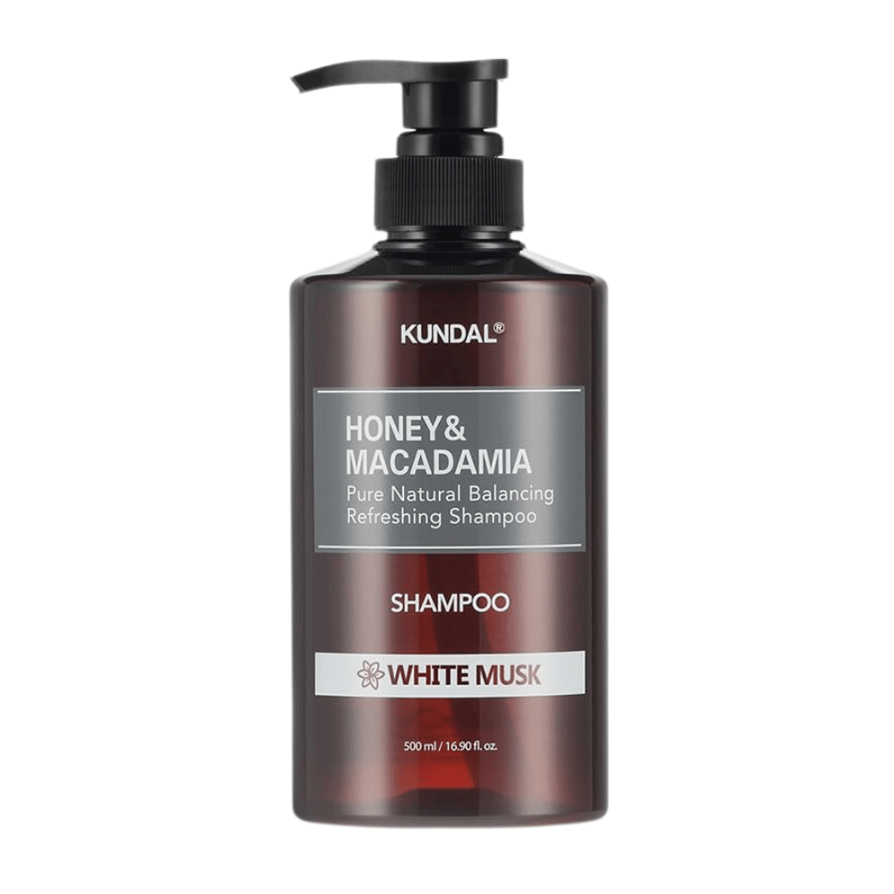 KUNDAL Honey & Macadamia Nature Shampoo White Musk σε καφέ πλαστικό μπουκάλι με αντλία, 500 ml.