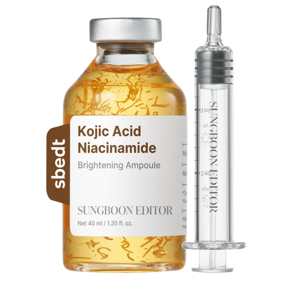 7. SUNGBOON EDITOR Kojic Acid Niacinamide Brightening Ampoule 40 ml – χρυσό μπουκάλι serum με ορατά ενεργά νήματα και διάφανο εφαρμοστή σε λευκό φόντο