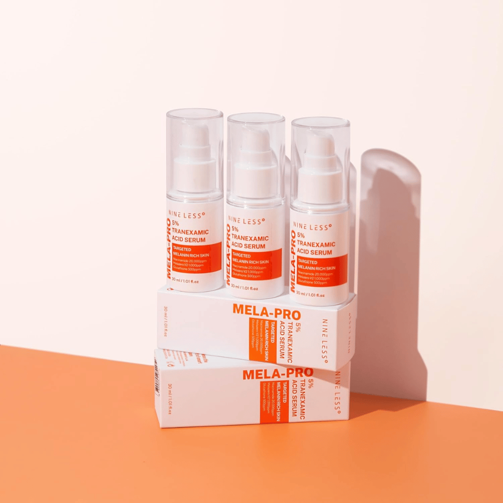 Τρία NINE LESS MELA-PRO 5% Tranexamic Acid Serum 30 ml, φωτεινός ορός με νιασιναμίδη και γλουταθειόνη για δέρμα πλούσιο σε μελανίνη.