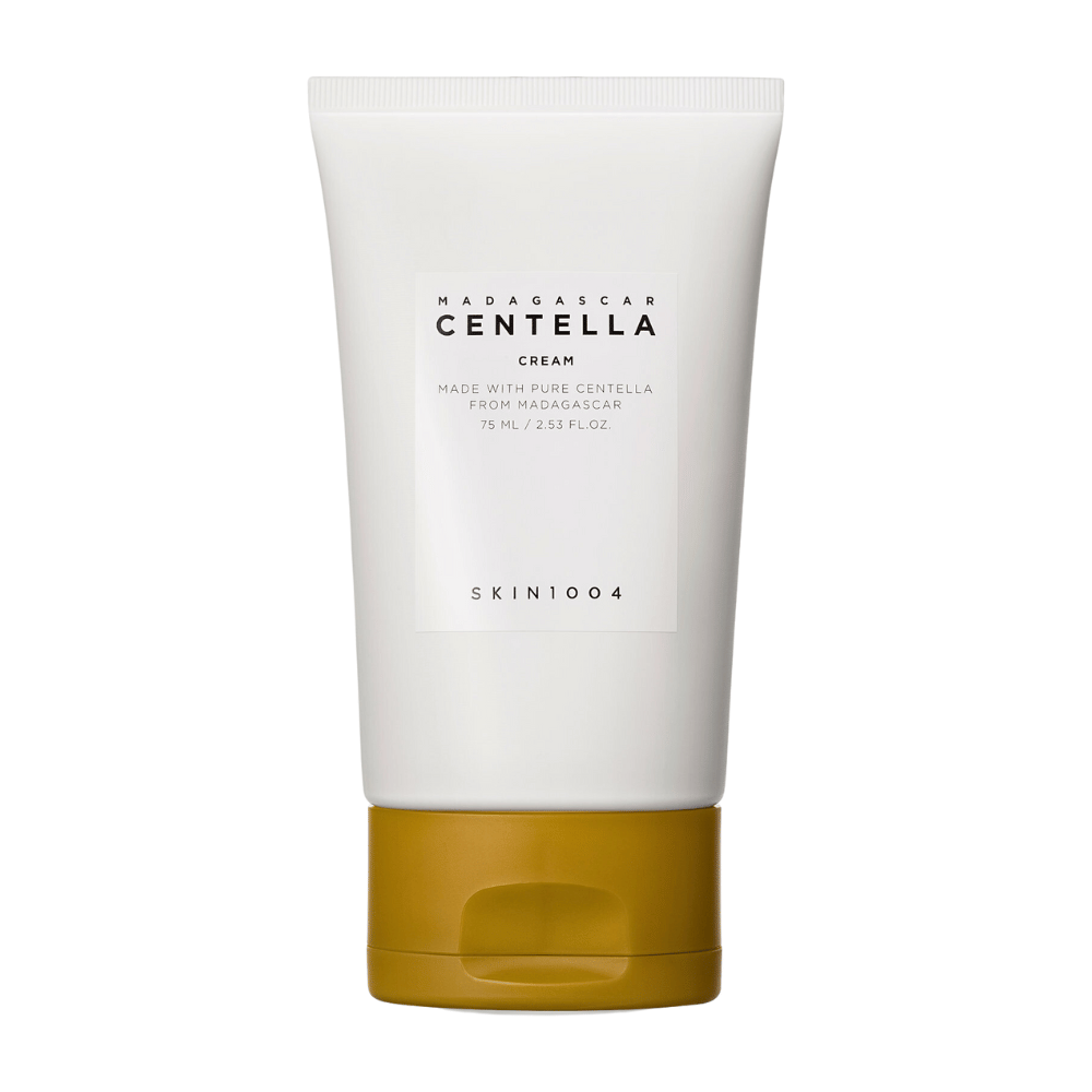 Η εικόνα δείχνει ένα σωληνάριο με "Madagascar Centella Cream" από SKIN1004. Είναι μια κρέμα δέρματος που παρασκευάζεται από καθαρή Centella από τη Μαδαγασκάρη και έρχεται σε συσκευασία των 75 ml / 2.53 fl.oz. Το προϊόν προορίζεται για χρήση στην περιποίηση του δέρματος, για να παρέχει θρέψη και υγρασία στο δέρμα.