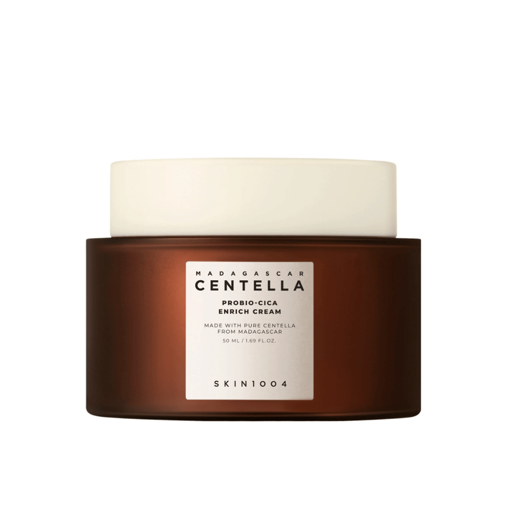 Ένα καφέ βάζο με Madagascar Centella Probio-Cica Enrich Cream σε ουδέτερο φόντο.