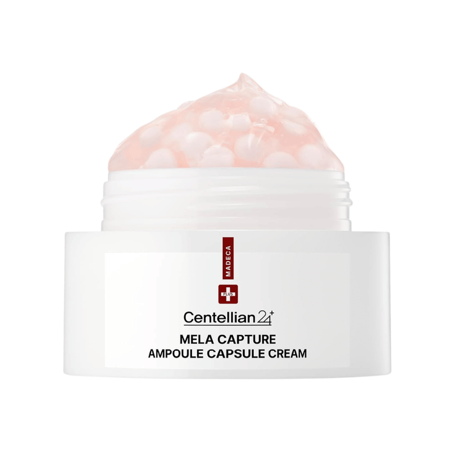 Κοντινή λήψη του/της Centellian24 Madeca Mela Capture Ampoule Capsule Cream που δείχνει τη ροζ κρέμα-τζελ με ενθυλακωμένες σφαίρες αμπούλας μέσα στο βαζάκι.