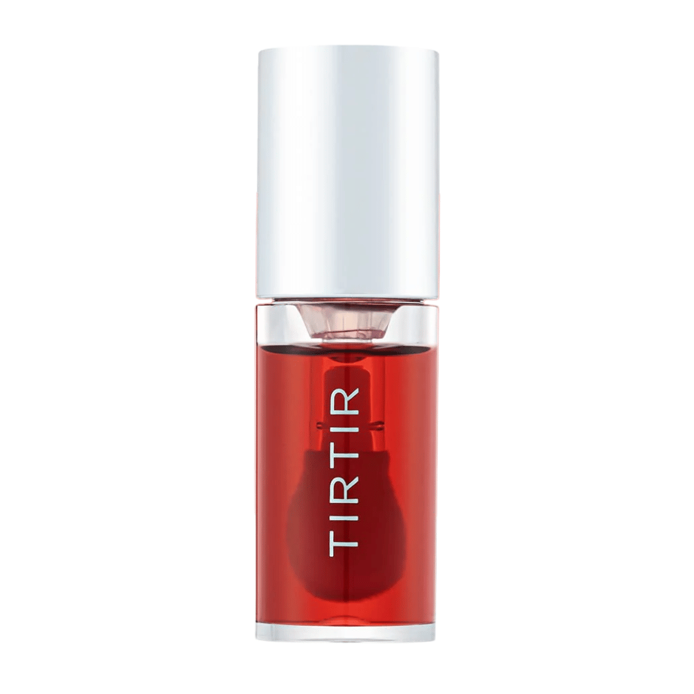 TIRTIR My Glow Lip Oil σε διαφανή κόκκινη απόχρωση με ασημένιο καπάκι, εμφανίζεται ευθεία μπροστά σε λευκό φόντο.