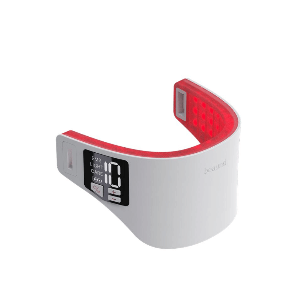 Beaund Neckcera με ενεργοποιημένη θεραπεία κόκκινου LED φωτός. Τα κόκκινα φωτεινά σημεία στο εσωτερικό δείχνουν την επιφάνεια θεραπείας που στοχεύει το δέρμα του λαιμού.