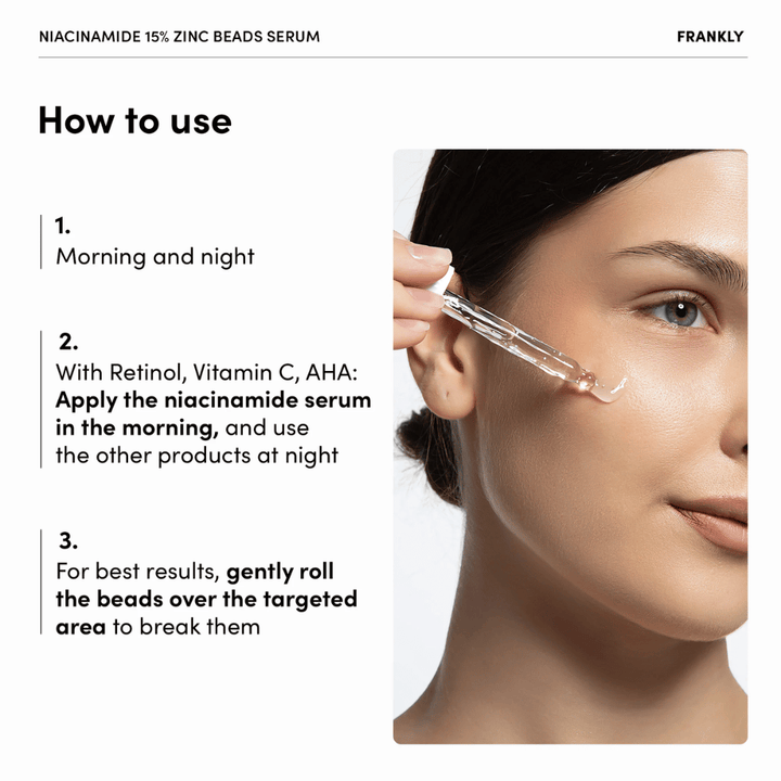 Kvinna applicerar FRANKLY Niacinamide 15% + Zinc Beads Serum med pipett på kind. Text förklarar användning morgon och kväll samt försiktig massering av pärlor.