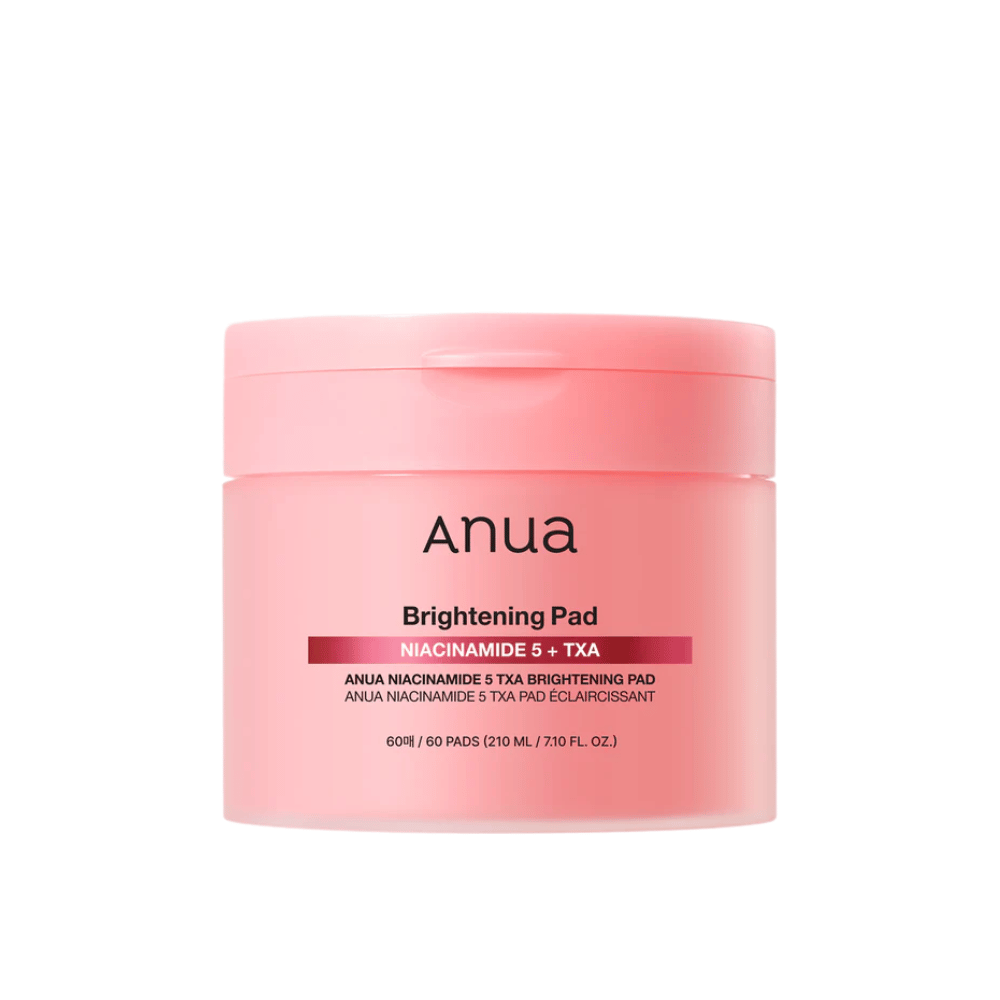 Ροζ συσκευασία του Anua Brightening Pad με την επιγραφή "Niacinamide 5 + TXA", περιέχει 60 pads για περιποίηση δέρματος με έμφαση στη λάμψη και ομοιόμορφο τόνο δέρματος.