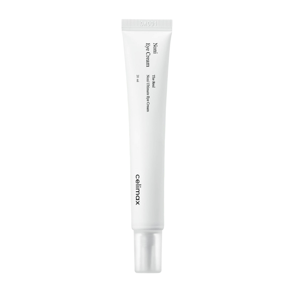Noni Eye Cream σε ένα λευκό σωληνάριο με διάφανο καπάκι. Το προϊόν είναι από τη μάρκα Celimax και περιέχει 20 ml. Το κείμενο στο σωληνάριο αναφέρει ότι είναι μια θρεπτική κρέμα ματιών.