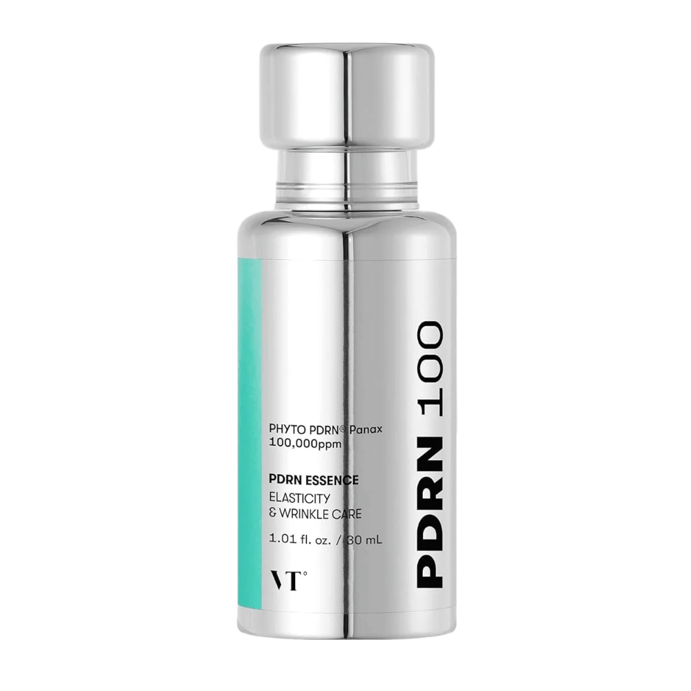 VT PDRN 100 Essence σε ένα ασημί μπουκάλι με κείμενο που αναφέρει περιεχόμενο: 100,000 ppm PHYTO PDRN® Panax για ελαστικότητα και φροντίδα ρυτίδων. Το μπουκάλι χωράει 30 ml και έχει έναν κομψό, καθρέφτη-γυαλισμένο σχεδιασμό.