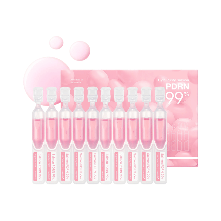 Medicube PDRN Pink One Day Serum Set με δέκα ατομικές αμπούλες και συσκευασία προϊόντος. Το σετ περιέχει ορό με 99% υψηλά εξευγενισμένο σολομού-PDRN για ενυδάτωση, λάμψη και καθημερινή φροντίδα της επιδερμίδας.