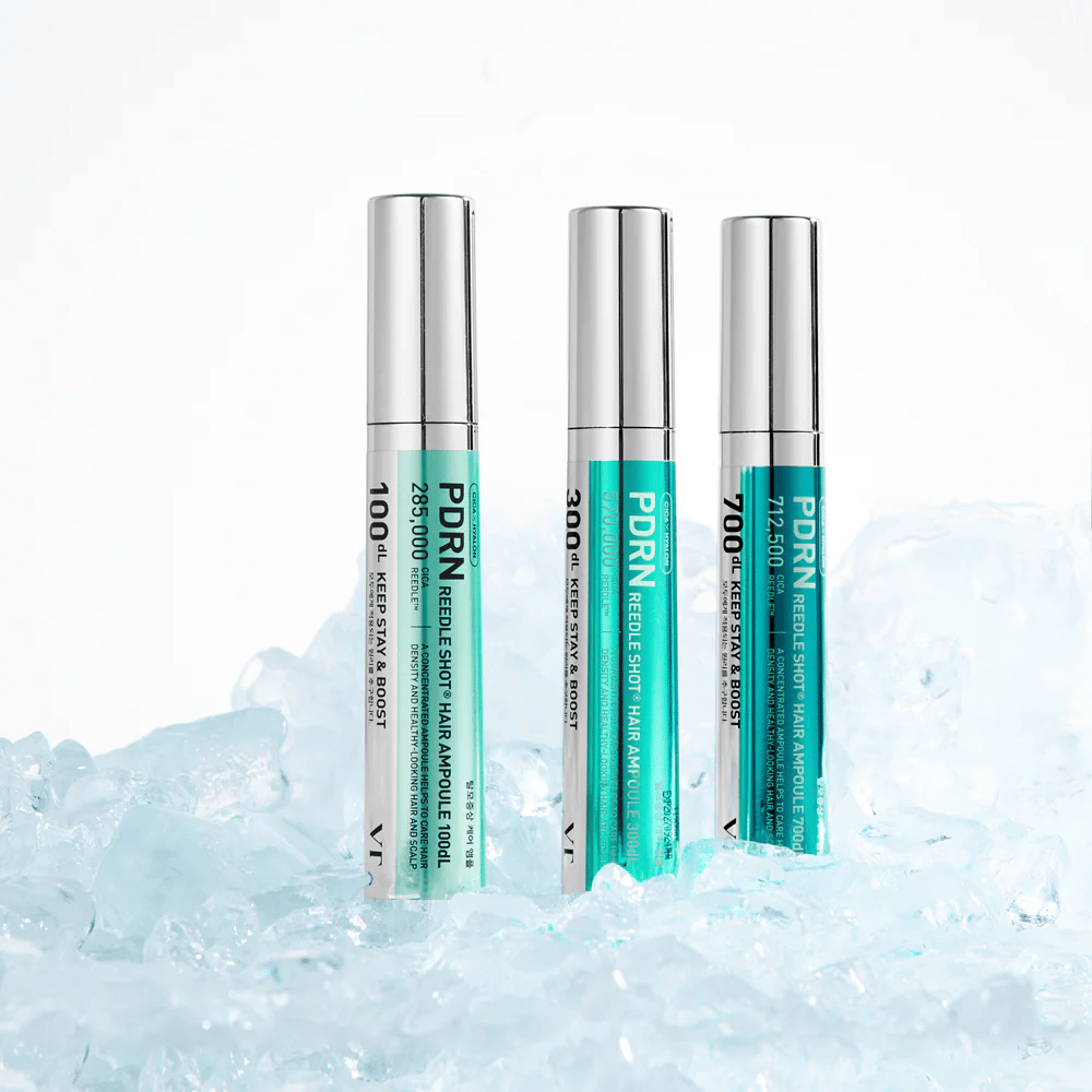 Διάφορες παραλλαγές του PDRN Reedle Shot Hair Ampoule τοποθετημένες σε πάγο, που συμβολίζουν την αναζωογονητική επίδραση και την εντατική φροντίδα για ένα ισορροπημένο και υγιές τριχωτό της κεφαλής.