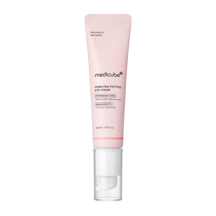 Medicube PDRN Pink Peptide Eye Cream σε ροζ σωλήνα, 30 ml. Κρέμα ματιών με PDRN και 5% νιασιναμίδη που αναζωογονεί το κουρασμένο δέρμα κάτω από τα μάτια και δίνει μια πιο σφιχτή εμφάνιση.