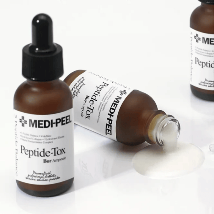 MEDI-PEEL Peptide-Tox Bor Ampoule με ορατή υφή ορού – αντιγηραντικός ορός με σύμπλεγμα πεπτιδίων που προσφέρει αυξημένη ελαστικότητα, γεμάτο δέρμα και πιο ομοιόμορφη υφή δέρματος.