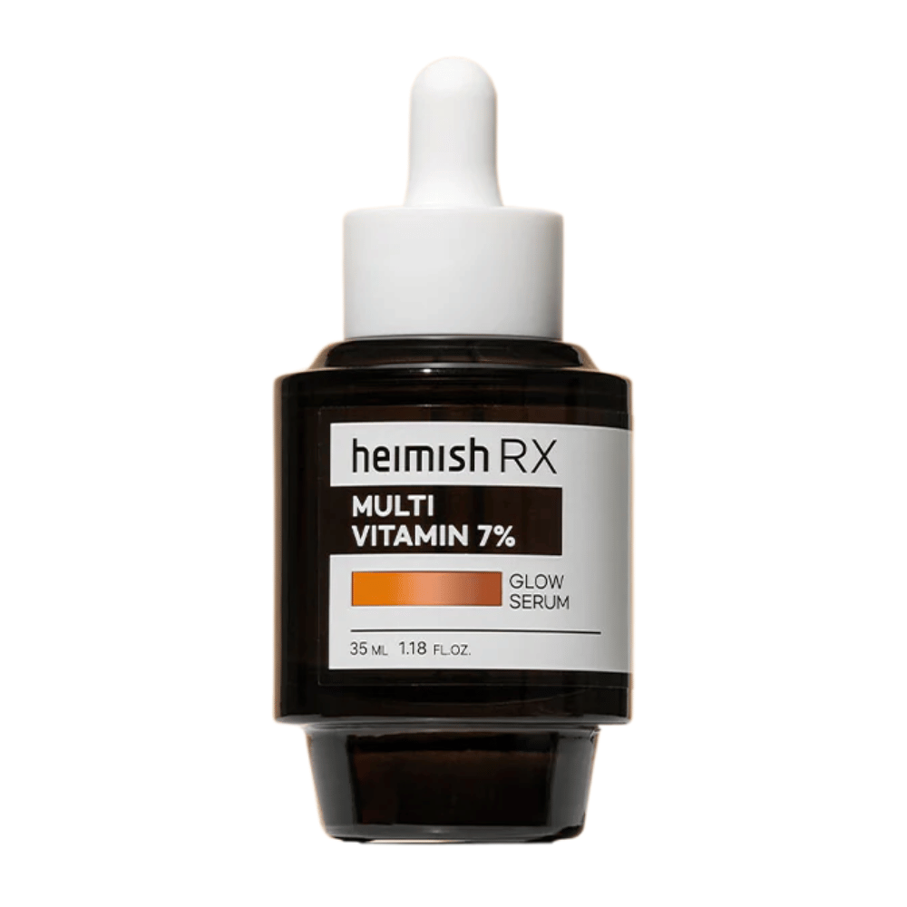 Heimish RX Πολυβιταμίνη 7% Glow Serum σε σκούρο γυάλινο μπουκάλι με καπάκι πιπέτας, σχεδιασμένη για να προσφέρει λάμψη και θρέψη στο δέρμα.