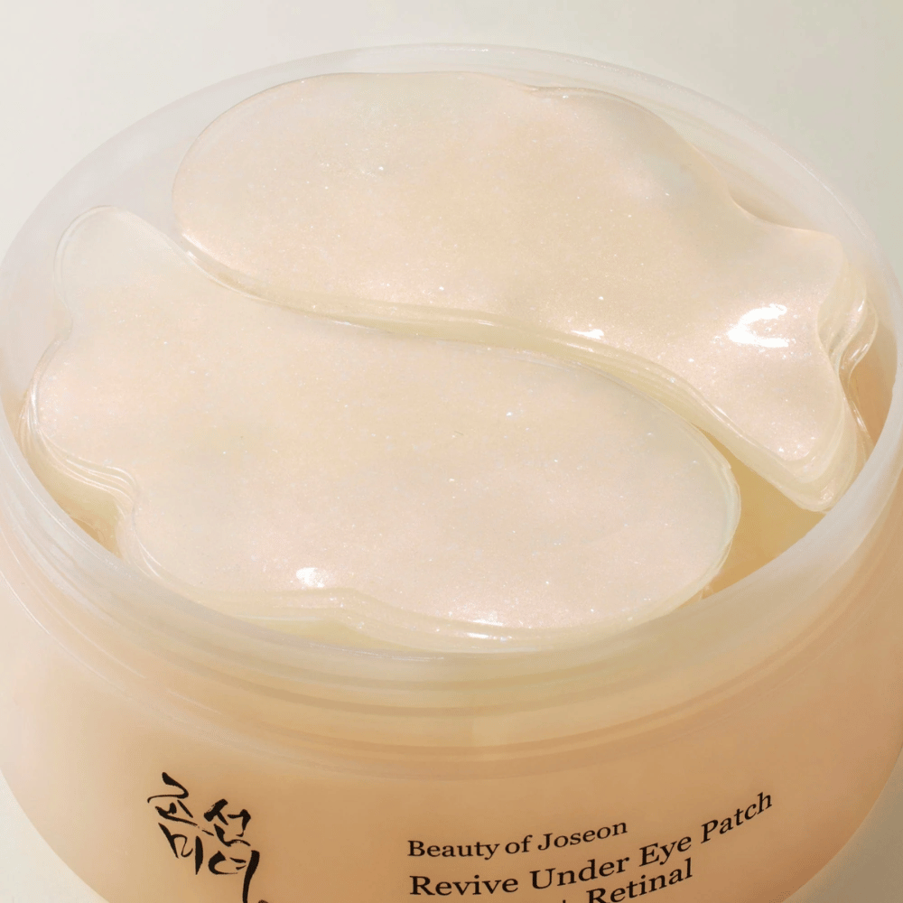 Επισκόπηση του Beauty of Joseon Revive Under Eye Patch σε δοχείο με πολλά gel patches, κορεατική φροντίδα ματιών για ξηρότητα, λεπτές γραμμές και κουρασμένο δέρμα γύρω από τα μάτια.