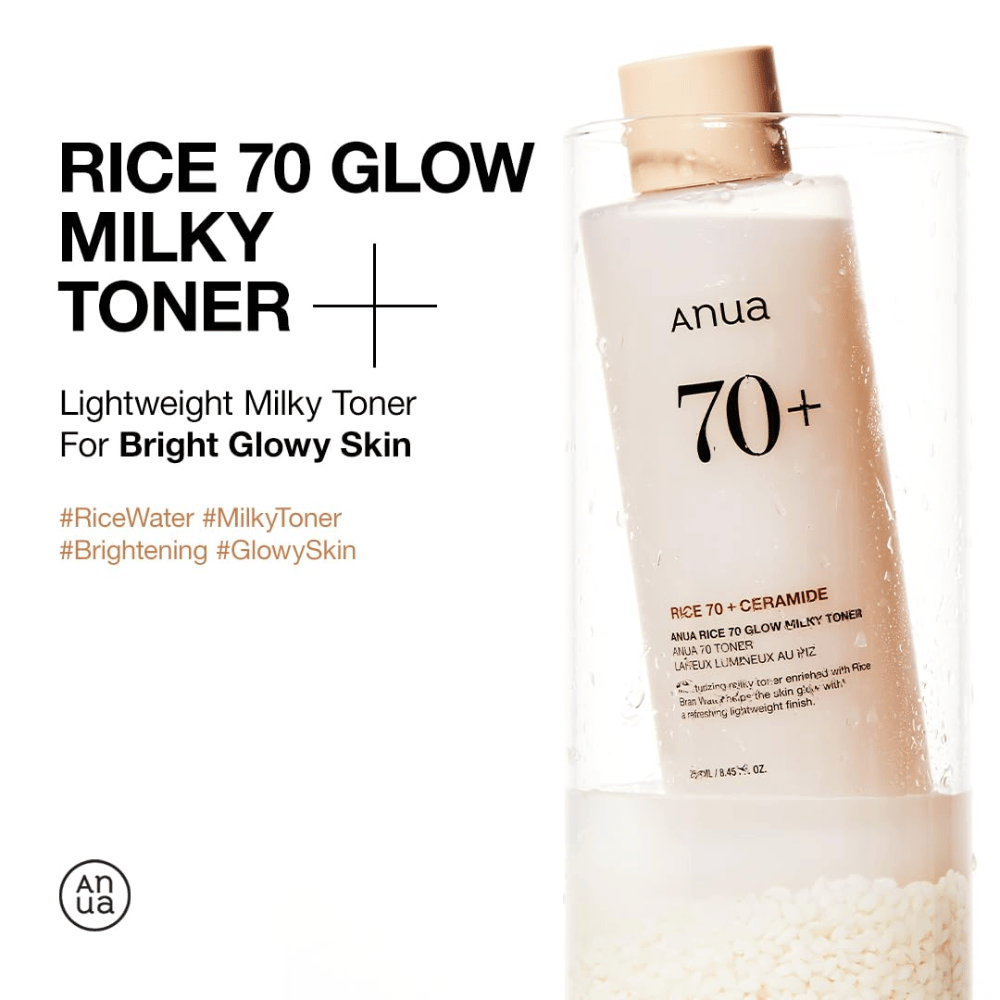 Ένα μπουκάλι "Anua Rice 70 Glow Milky Toner". Είναι μια ελαφριά γαλακτώδης τονωτική λοσιόν σχεδιασμένη για να προσφέρει φωτεινό και λαμπερό δέρμα. Το προϊόν είναι εμπλουτισμένο με νερό ρυζιού και κεραμίδια, όπως αναφέρεται στην ετικέτα του μπουκαλιού. Αυτή η τονωτική λοσιόν είναι ιδανική για να επιτύχετε ένα λαμπερό δέρμα με μια φρέσκια, ελαφριά αίσθηση.