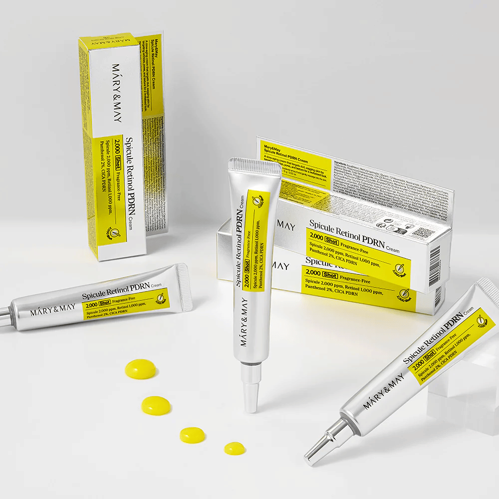 MARY & MAY Spicule Retinol PDRN Cream με πολλαπλά σωληνάρια και ορατή υφή κρέμας, σχεδιασμένη για να διεγείρει την ανανέωση των κυττάρων, να βελτιώνει την ελαστικότητα και να προσφέρει ομοιόμορφο τόνο δέρματος.