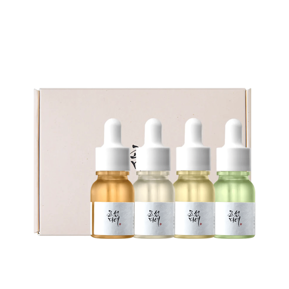 Ένα κουτί με τρία μπουκάλια Hanbang Serum Discovery Kit 4 τεμ από Beauty of Joseon, το καθένα προάγει μια νεανική λάμψη και μειώνει τις ρυτίδες.