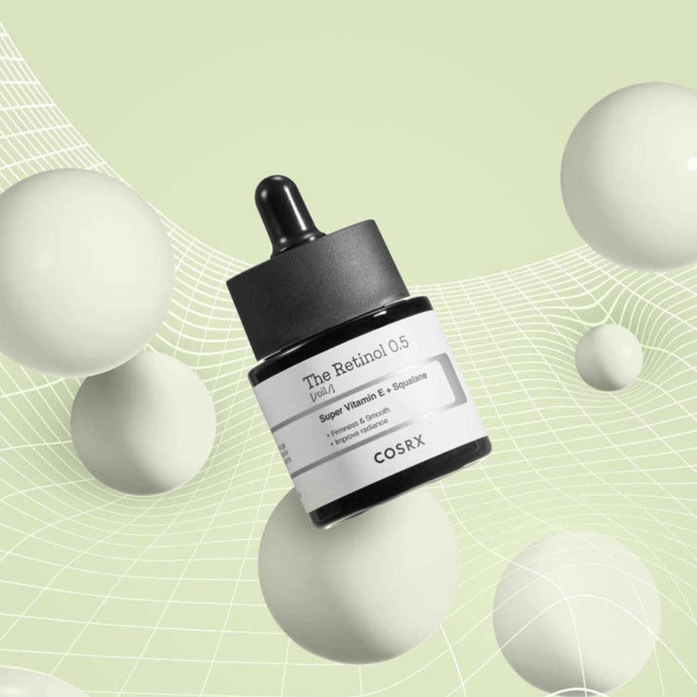 Ένα μπουκάλι COSRX Ρετινόλη 0.5 Λάδι 20ml που προάγει τα αντιγηραντικά οφέλη σε λευκό φόντο.